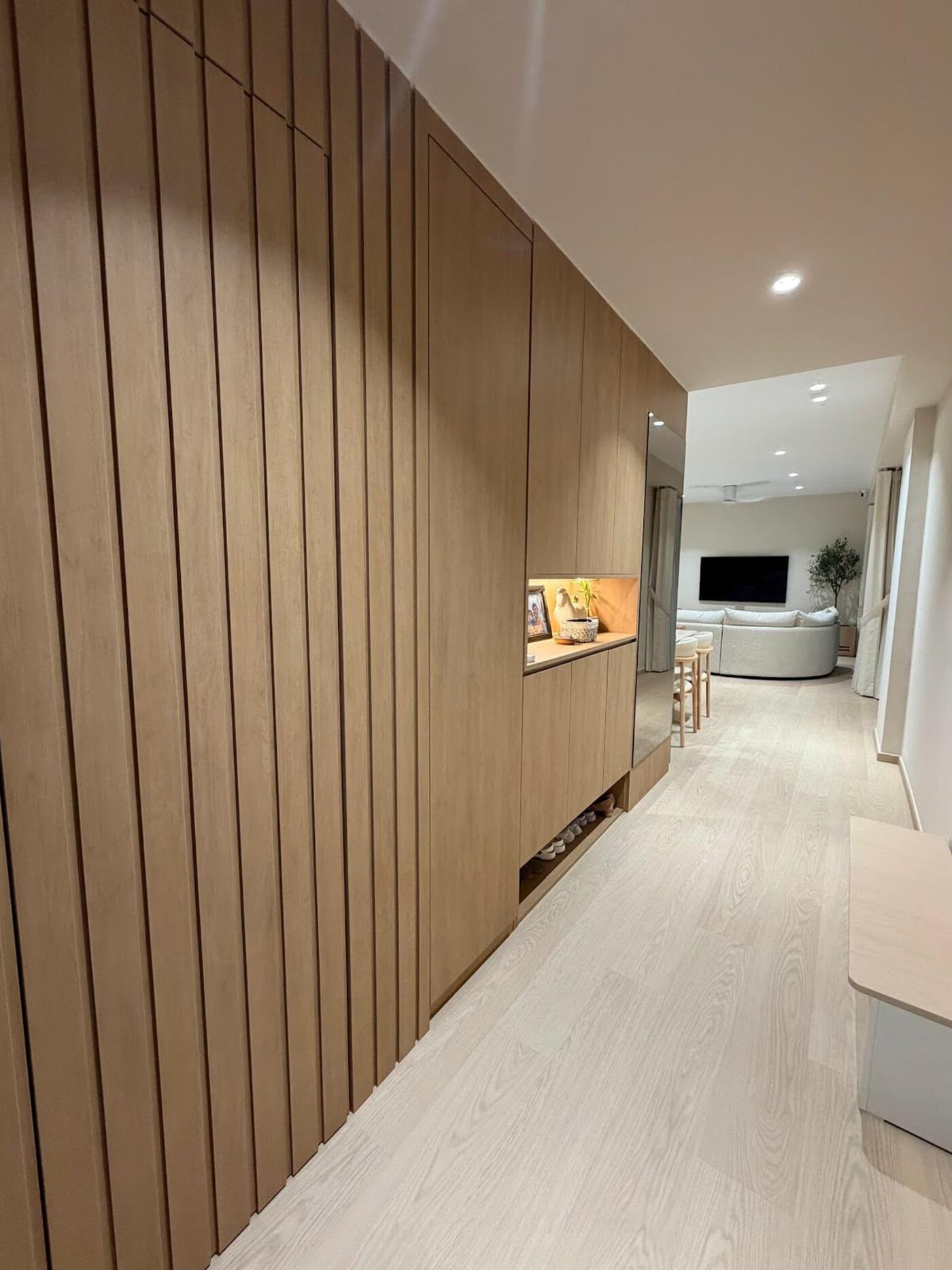 Fluted oak corridor with concealed shoe storage